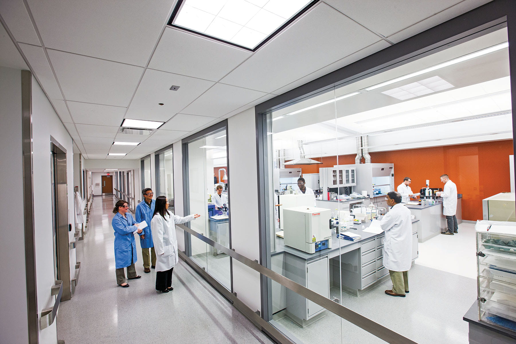 A West Scientist showing customers our labratory