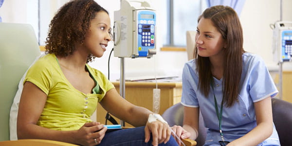 Cancer Patient at Doctor Office getting treatment