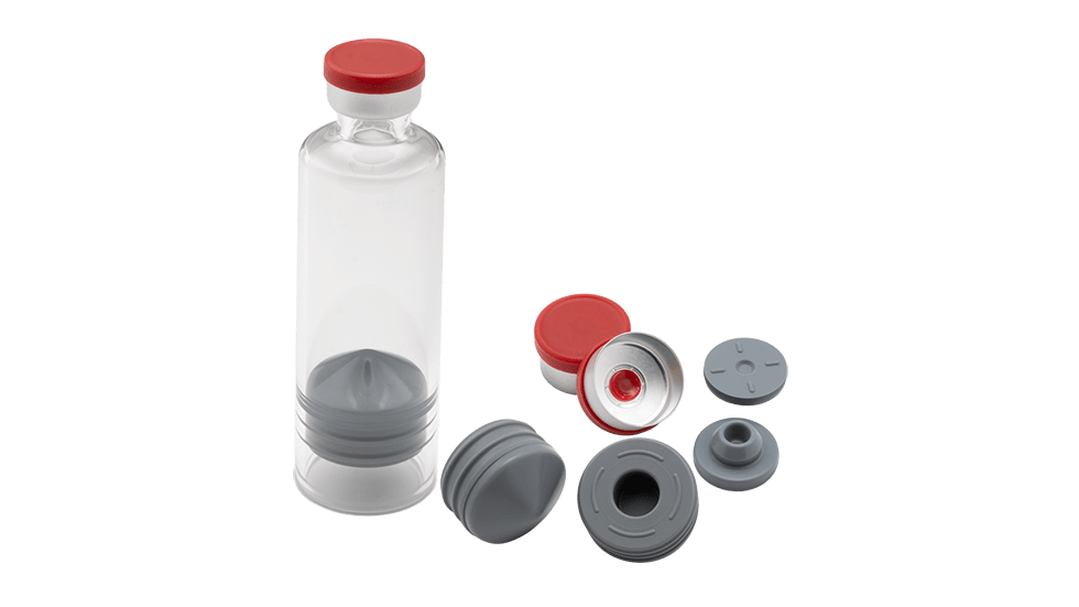 A woman holding a cartrdige and inserting it into an injection system